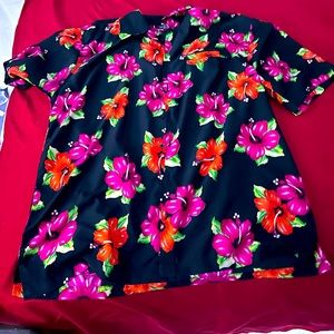 Lot of 14 button up shirts. Most are short sleeve and size large or XL.